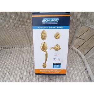 Schlage Plymouth Front Entry Handleset Flair Lever Bright Brass F60 PLY 605 FLA